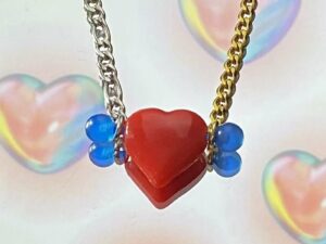 Collier coeur rouge et piercing